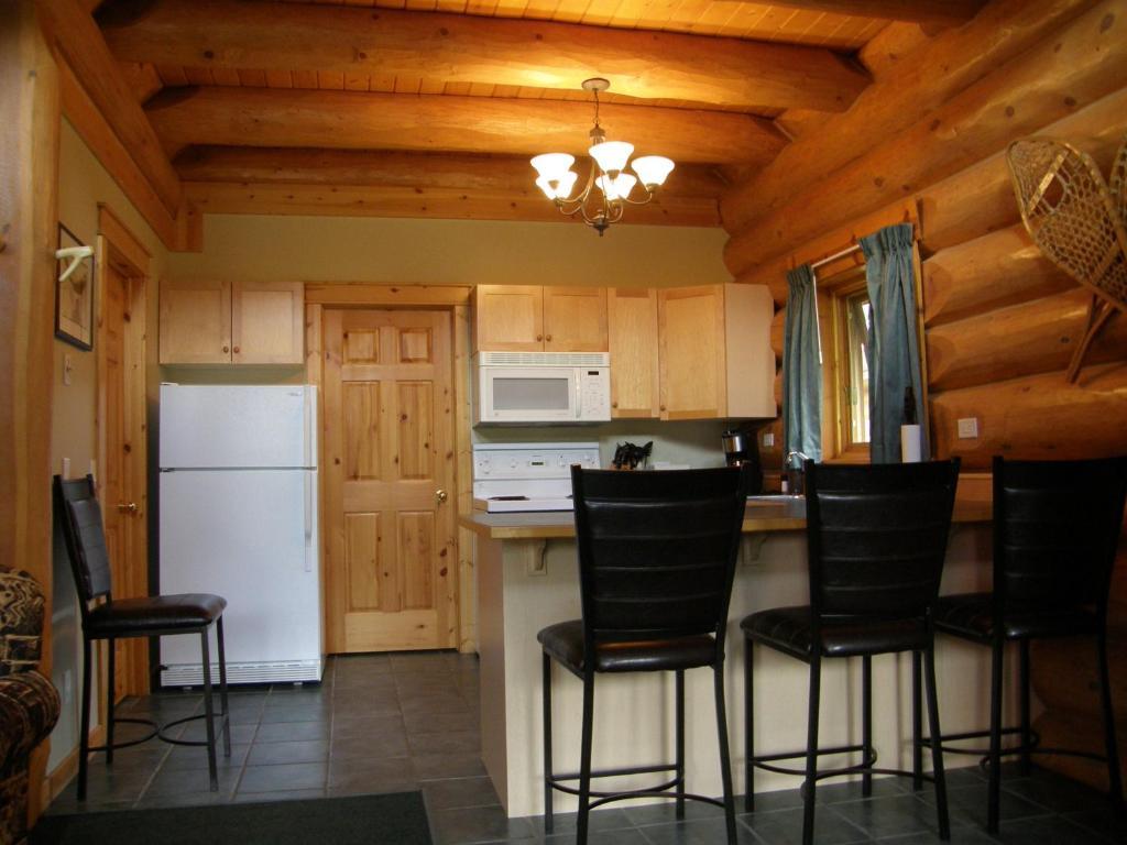 Vila Yoho Chalets Golden Pokoj fotografie